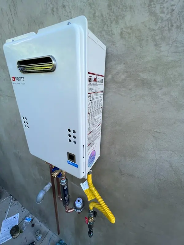 Tankless water heater installation for Warbasse homes